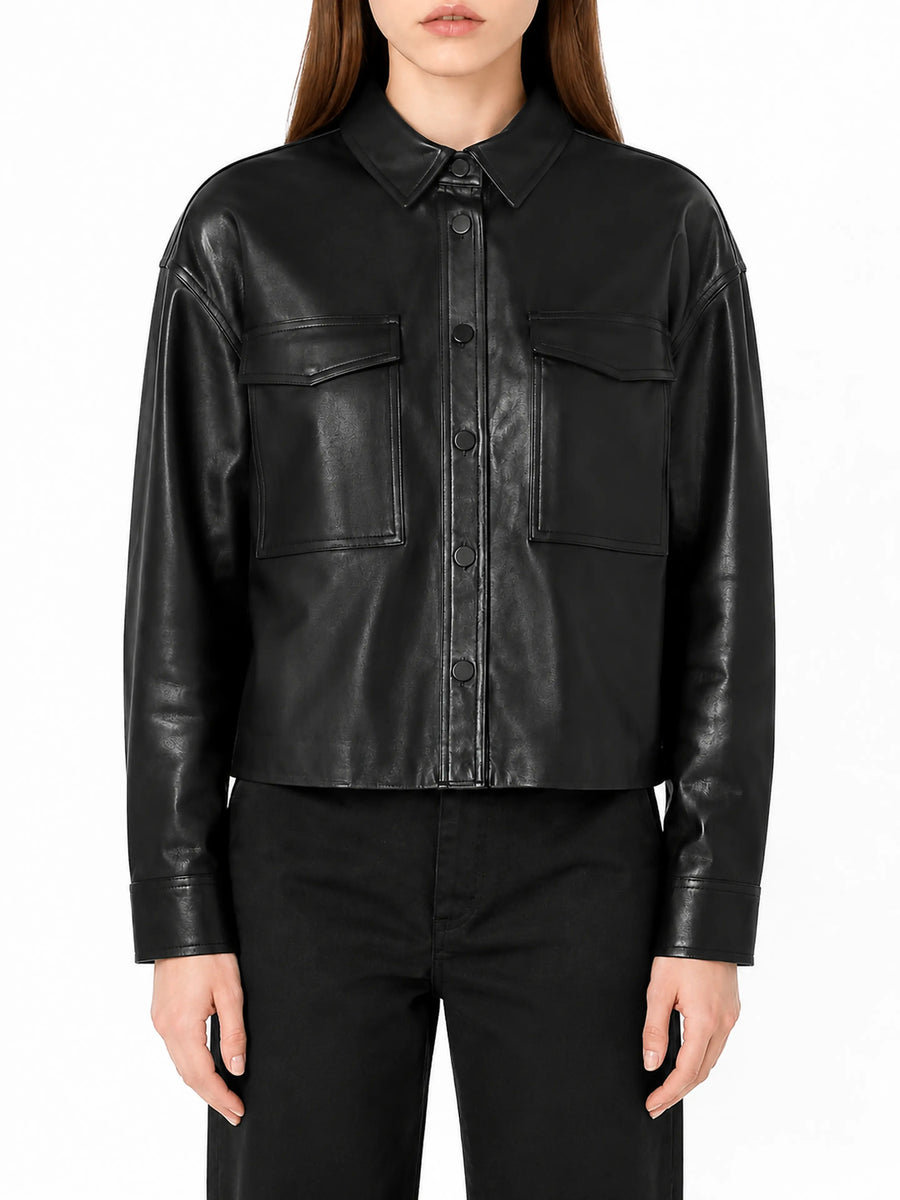 Women's black leather shirt jacket on model, front hero view