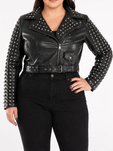 Women's black pyramid-studded biker jacket on a plus-size model, studio hero image