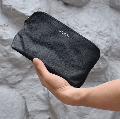 Noora New Stylish Black Leather Unisex travel pouch With One main compartment One zip pocket. - Noora International